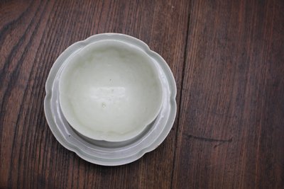 影青釉花扣盏托套